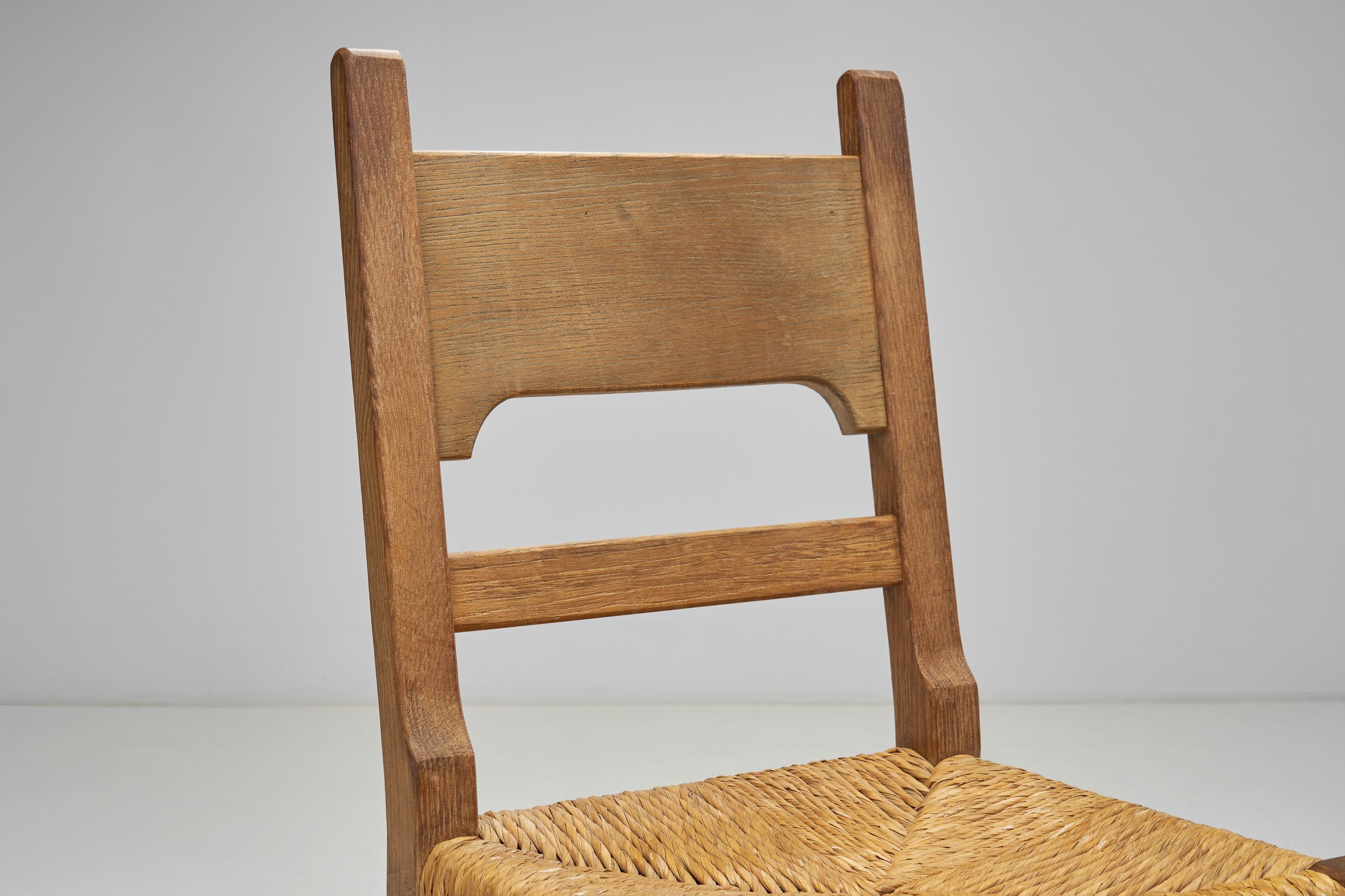 Six Brutalist Dining Chairs with Rush Seats, Europe ca 1960s — H
